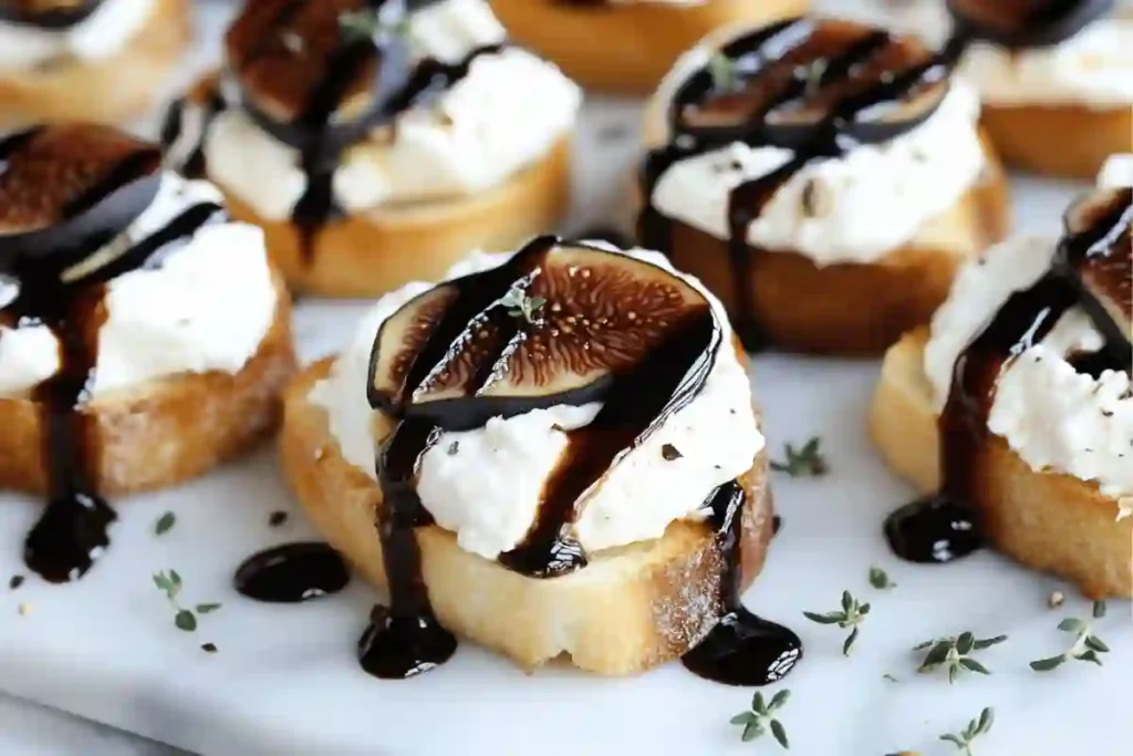 Crispy crostini topped with creamy goat cheese, sweet fig jam, and a drizzle of balsamic glaze.